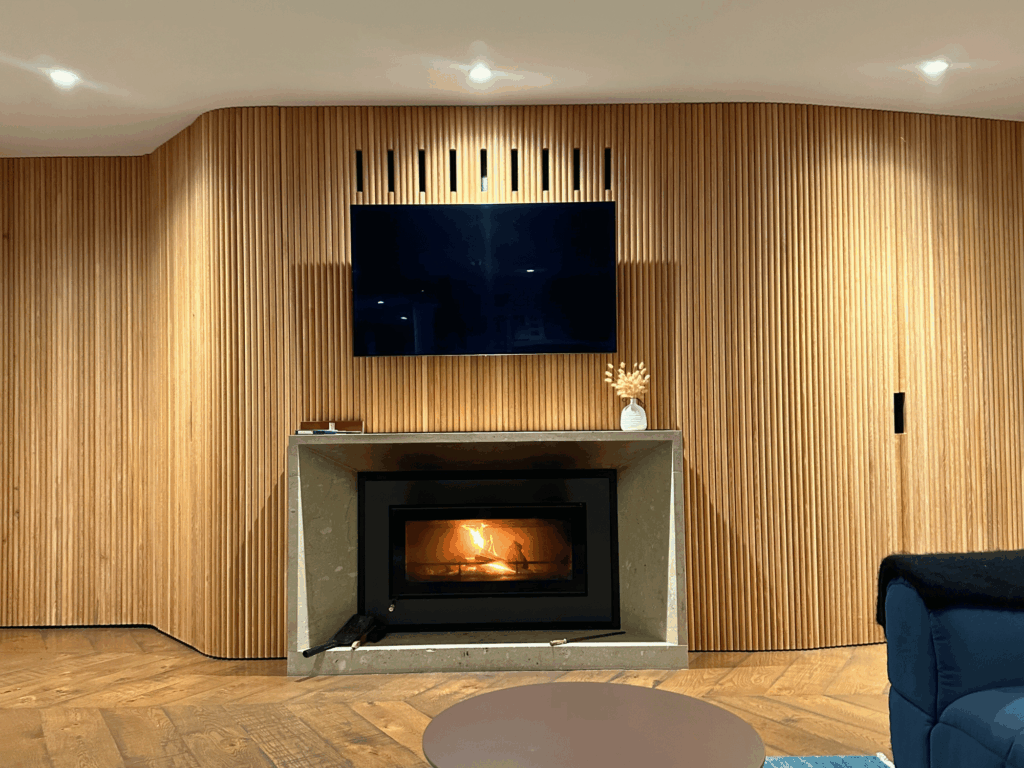 Quality downlights above a fireplace